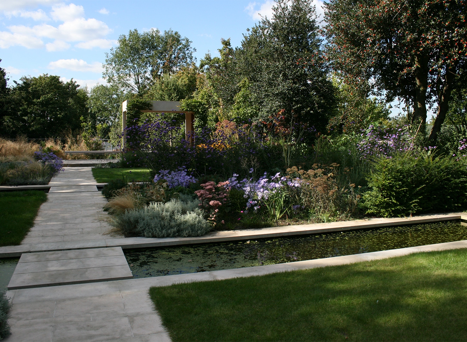 A view of the canal in the arts and crafts themed garden