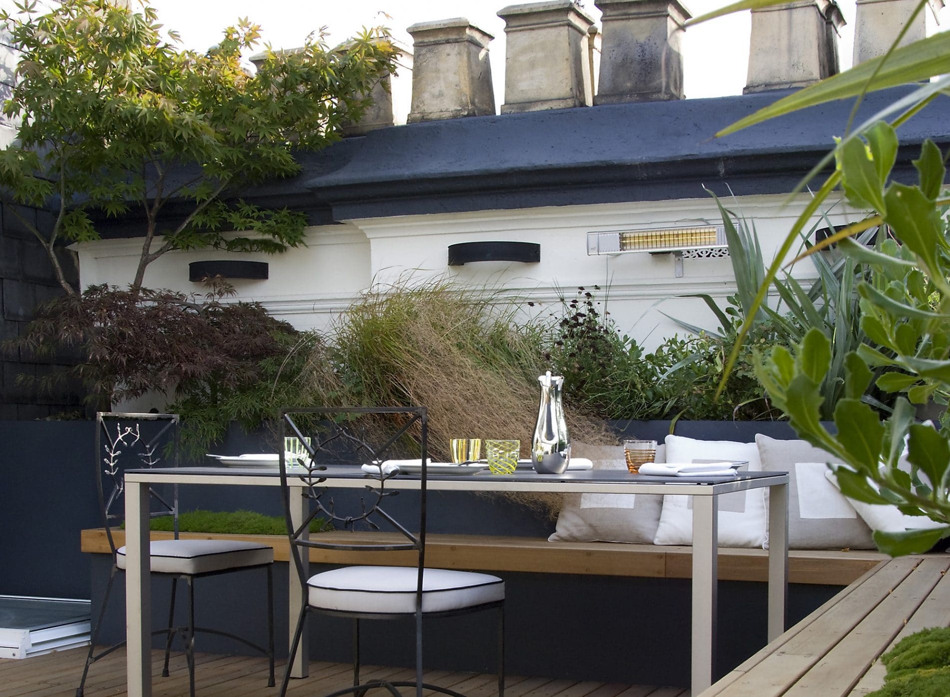 View of the dining area with chimneys on the roof above