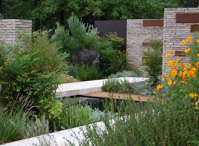 View of the garden for the Gardening World Cup 2010 showing the contrast between the flowers and greenery and the metal and stone