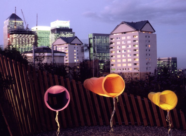 Colourful windsock sculptures on a roof terrace in Docklands