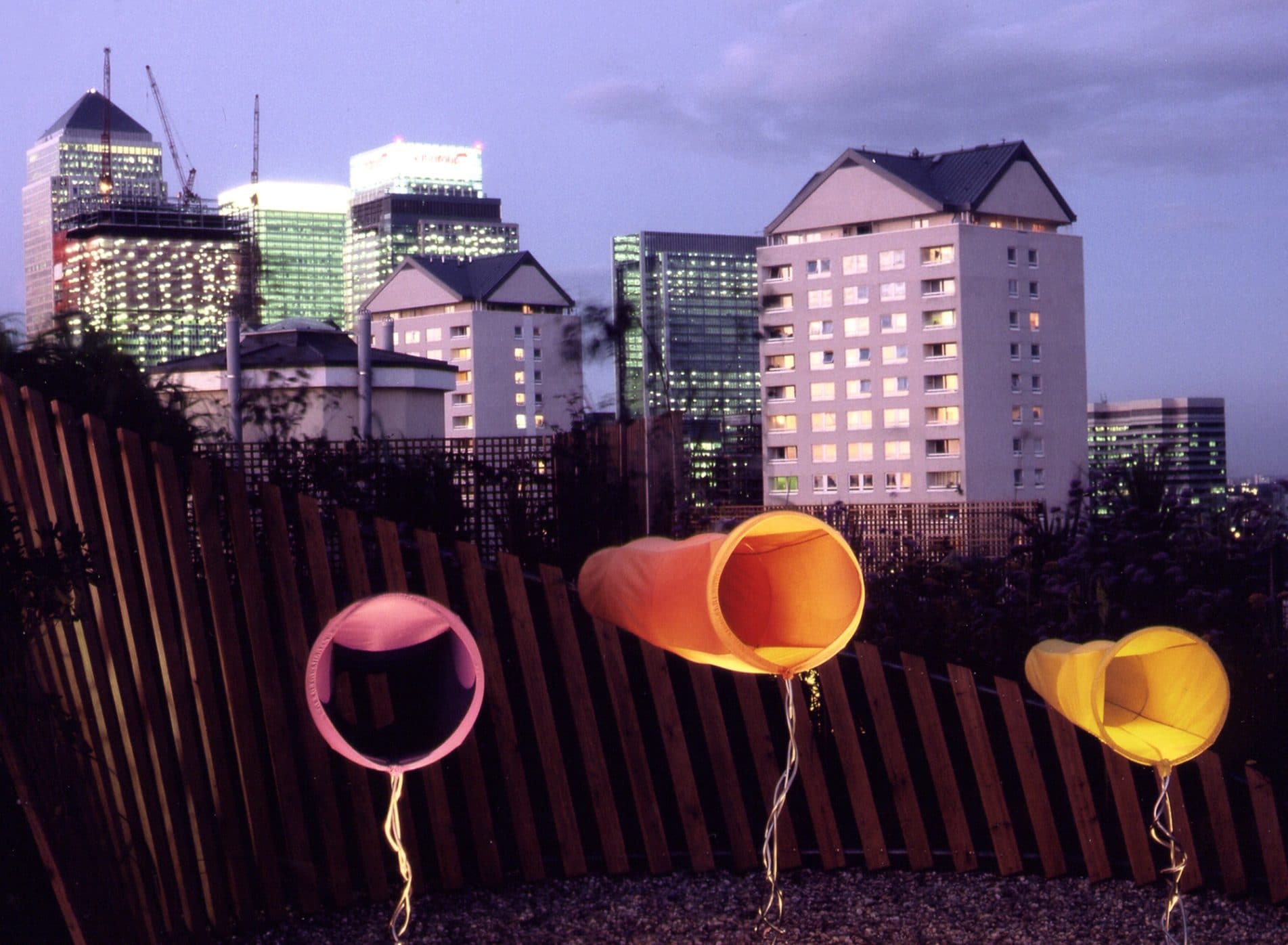 Colourful windsock sculptures on a roof terrace in Docklands