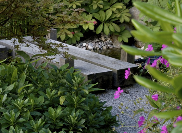 Contemporary take on a wooden bridge - Modern Japanese Garden