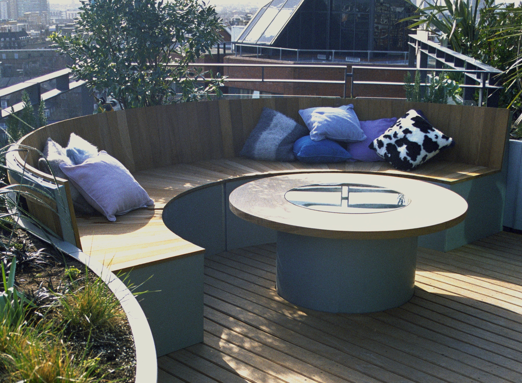 Seating area with comfy cushions and bespoke table - Pavilion Terrace
