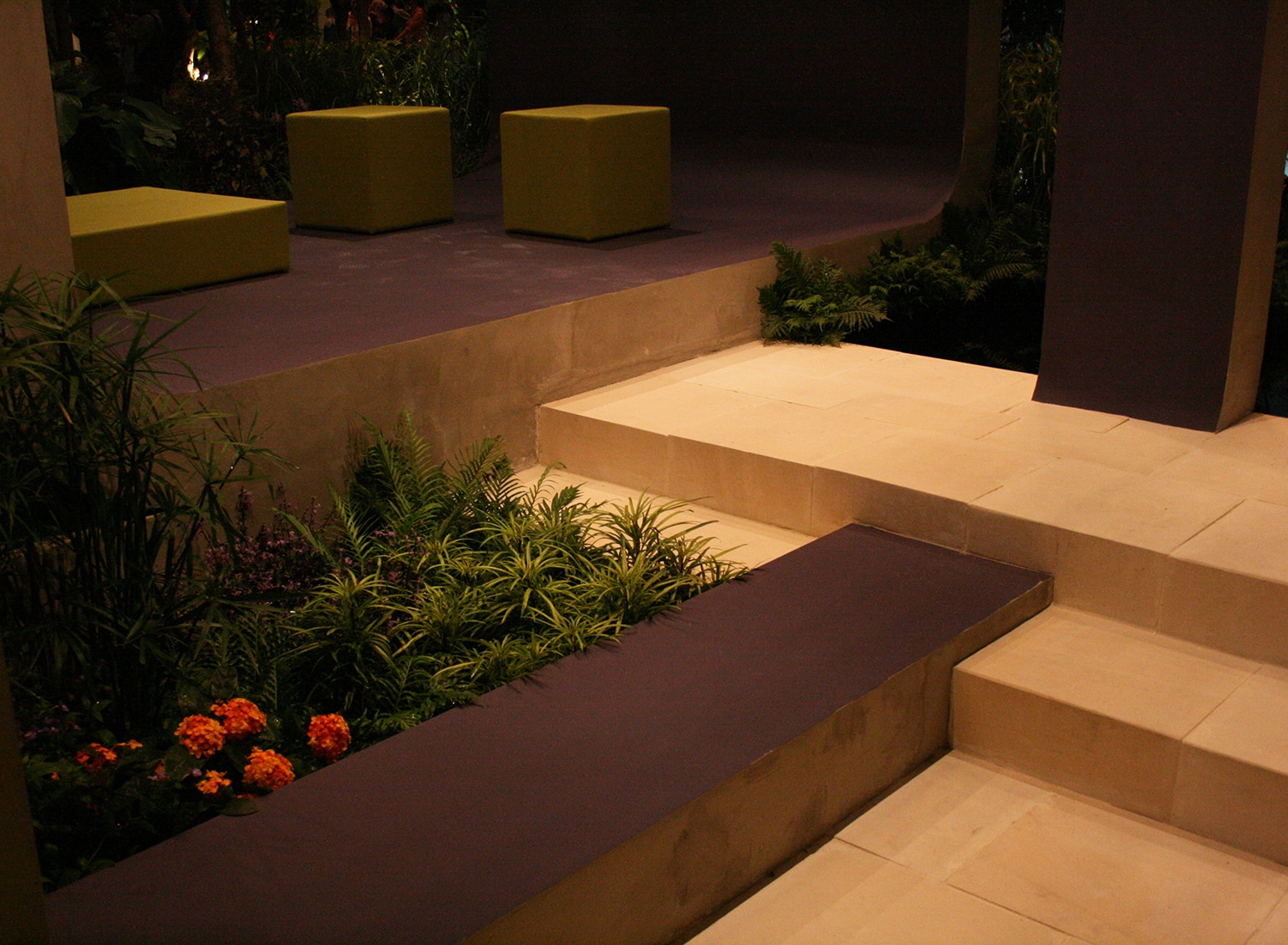 Planted border next to a stepped path - Singapore Garden Festival 2008