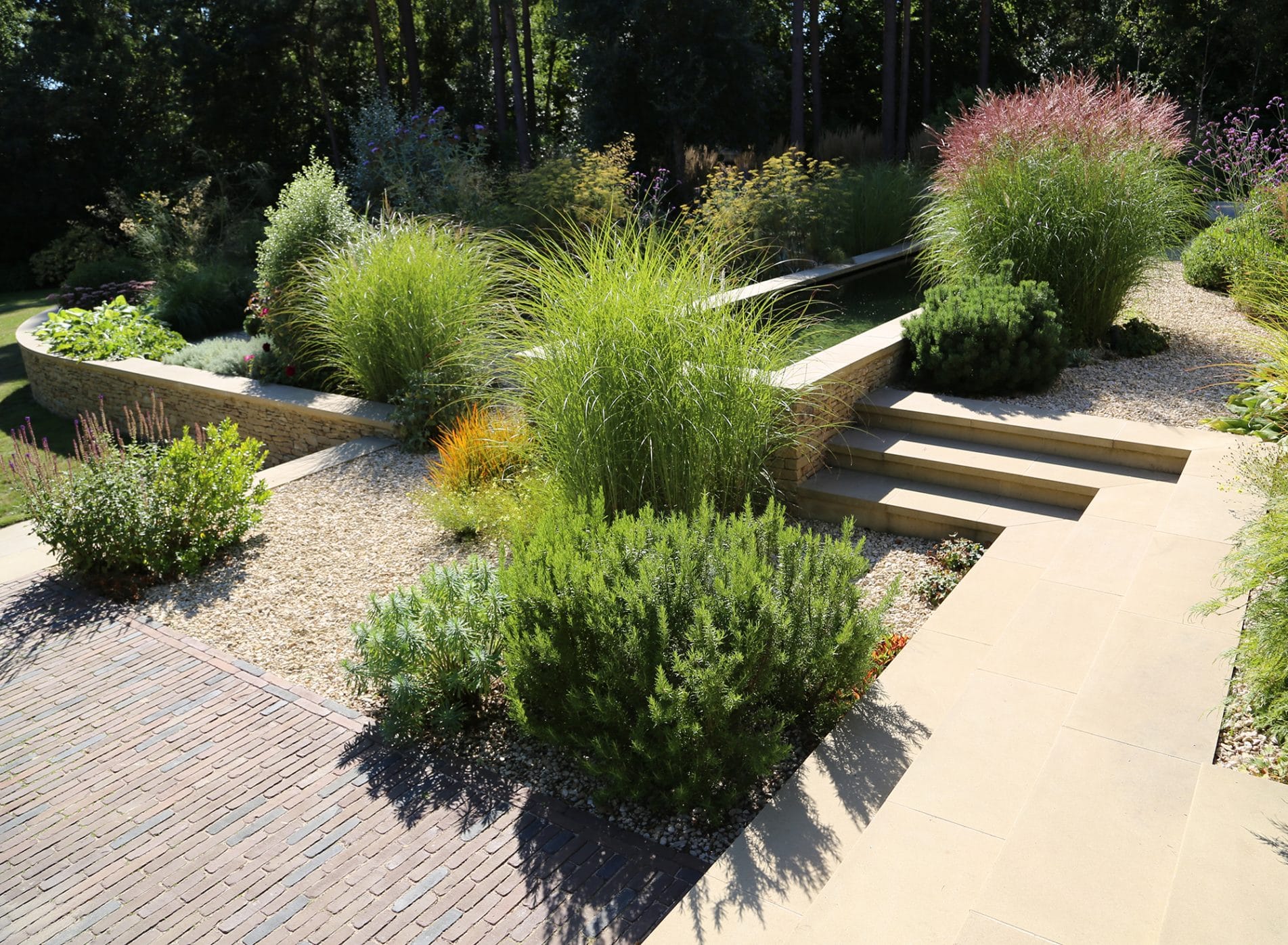 Steps down to a brick and gravel area