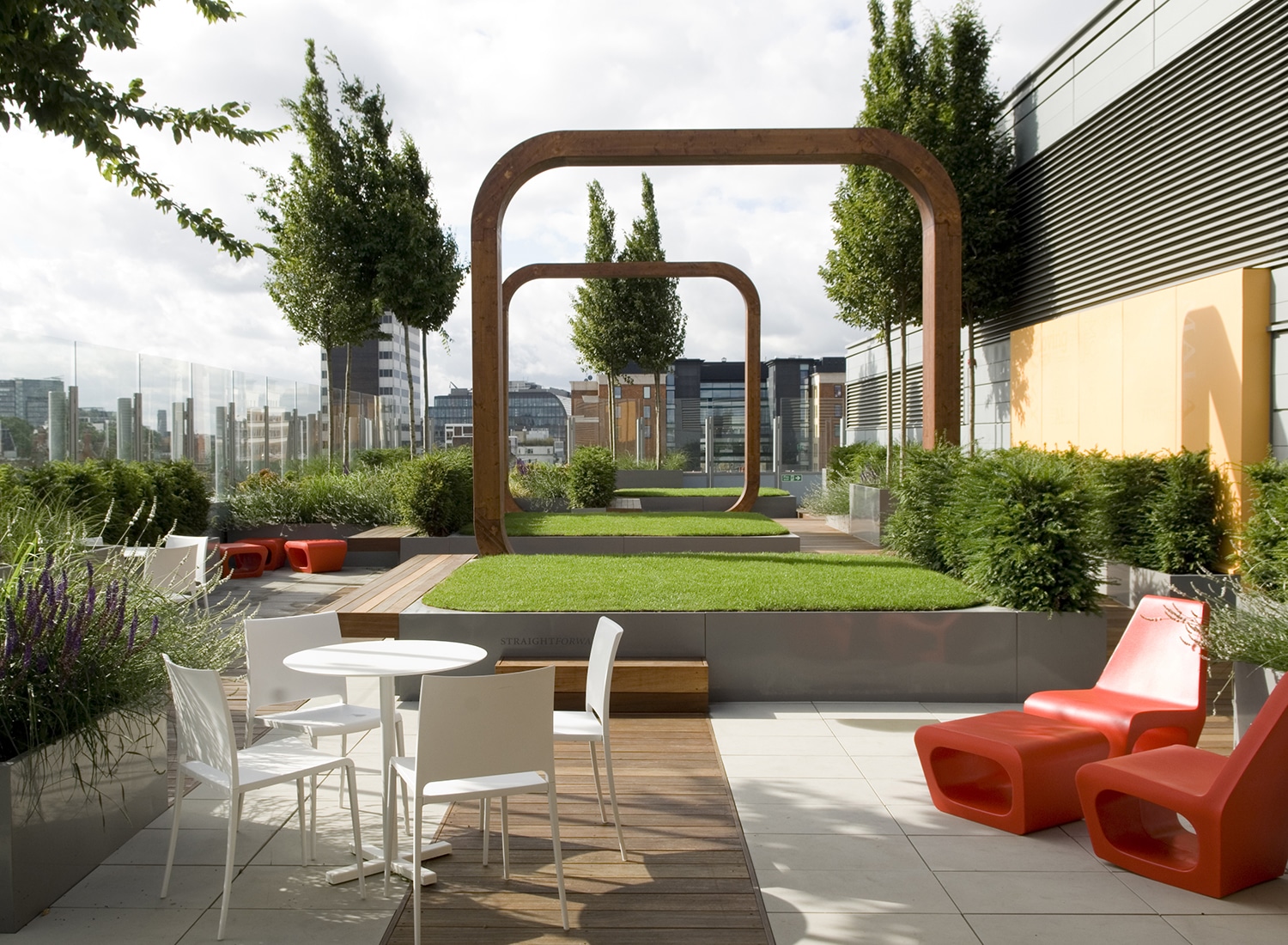 View from a seating area down the wooden arches