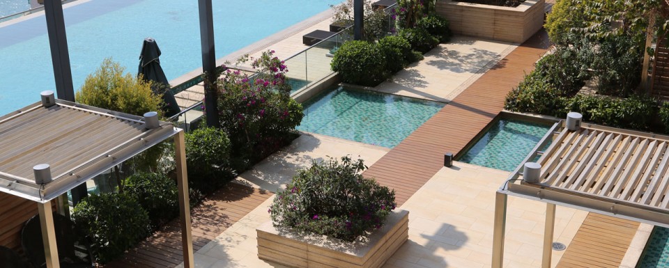 2014 Society of Garden Designers Hardscape award winning garden - pool deck at Westminster Terrace Hong Kong