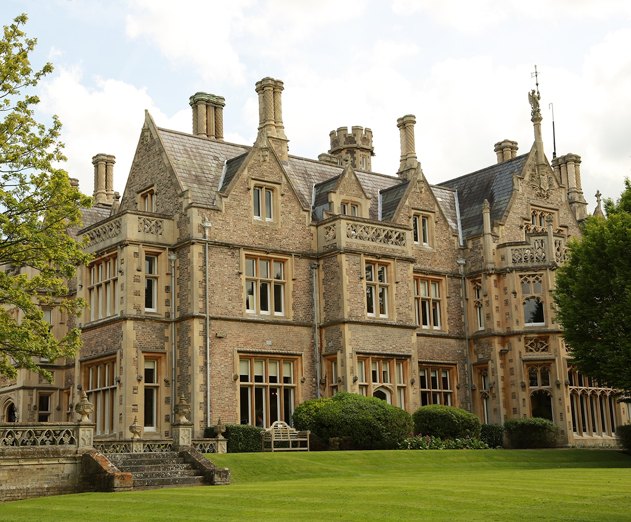 Grand Building With Neat Lawn And Hedges