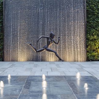 Female Statue Running With Waterfall Backdrop And Fountain Homatin Hillside by Garden Designer Andy Sturgeon