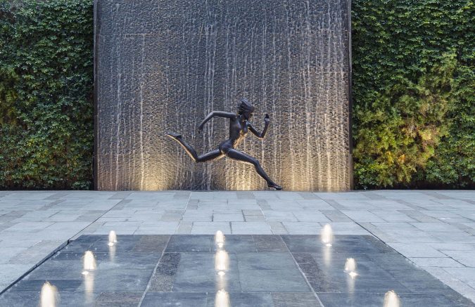 Female Statue Running With Waterfall Backdrop And Fountain Homatin Hillside by Garden Designer Andy Sturgeon