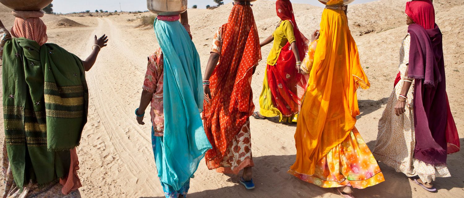 Girls collecting water in Thar desert