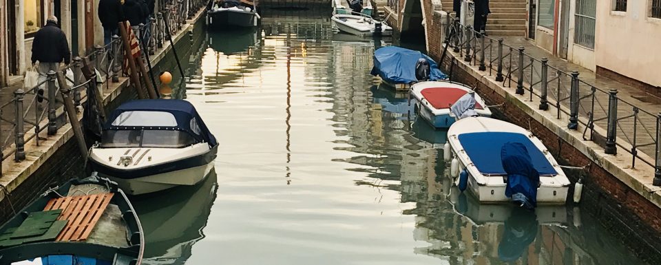 Boats moored on the canals of Venice