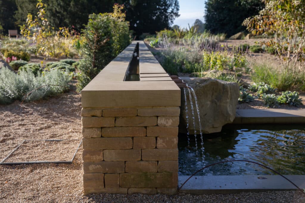 Modern rill in surrounded by mediterranean planting