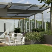 Seating area by a glass screen