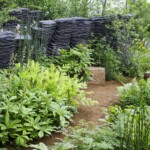 M&G Chelsea flowwr show garden designed by Andy Sturgeon, Chelsea 2019 UK The award winning M&G RHS Chelsea Flower Show 2019 garden - planting and slate formations
